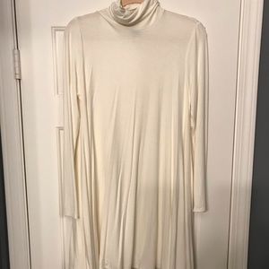 Off white just above the knee turtle neck dress
